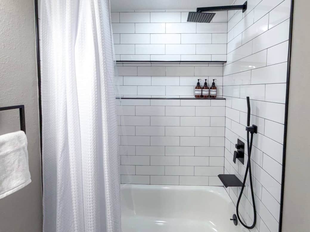 Shared full bathroom upstairs. Stocked with body wash, shampoo, and conditioner. Unwind after a day of exploring with a relaxing shower.
