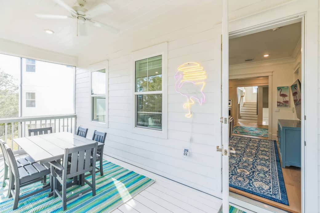 Screened-in patio off the dining room offers seating for 6!
