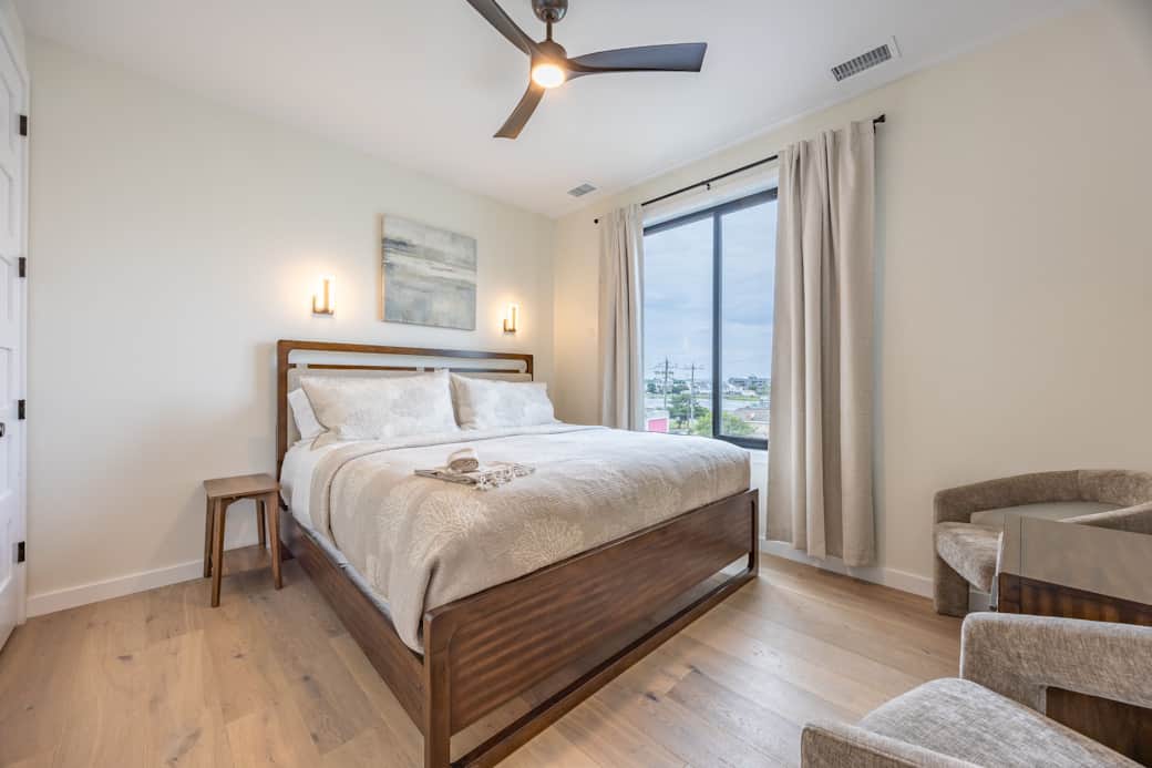 Primary bedroom with coastal decor at Driftwood Carolina NC
