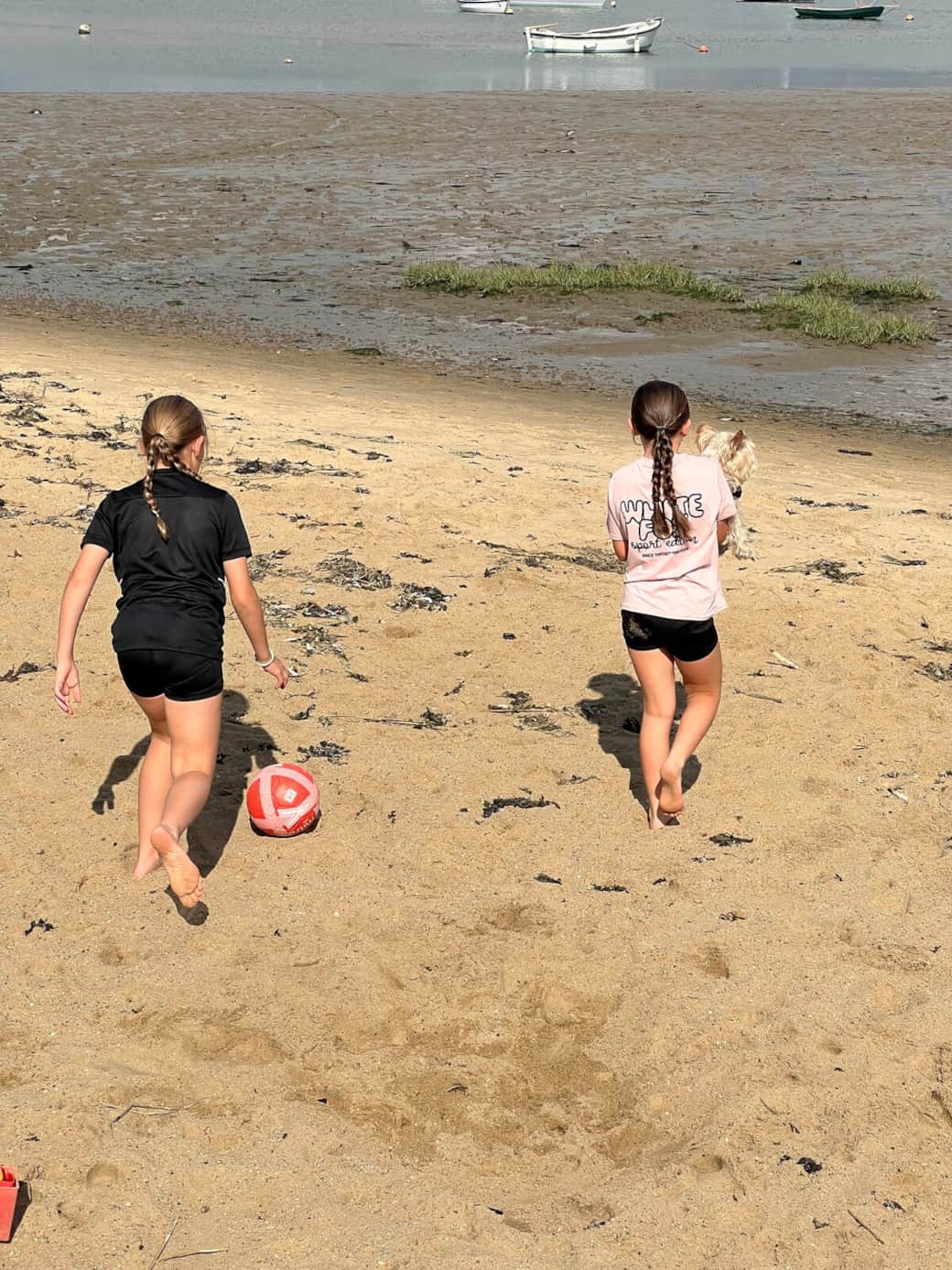 Girls playing on beach 
