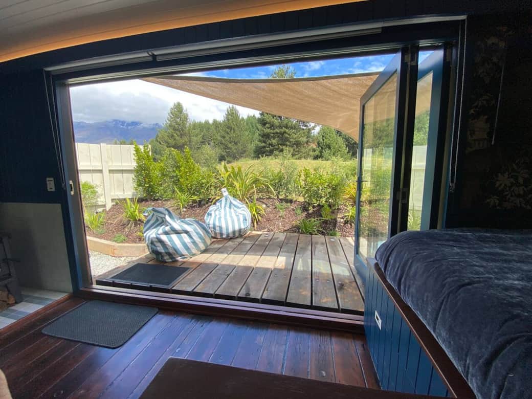 Bifold doors open to private deck
