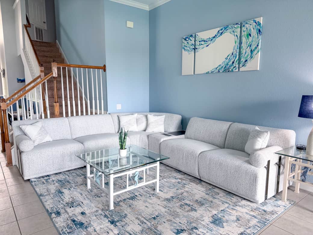 New plush sofa with built-in device charging and cupholders