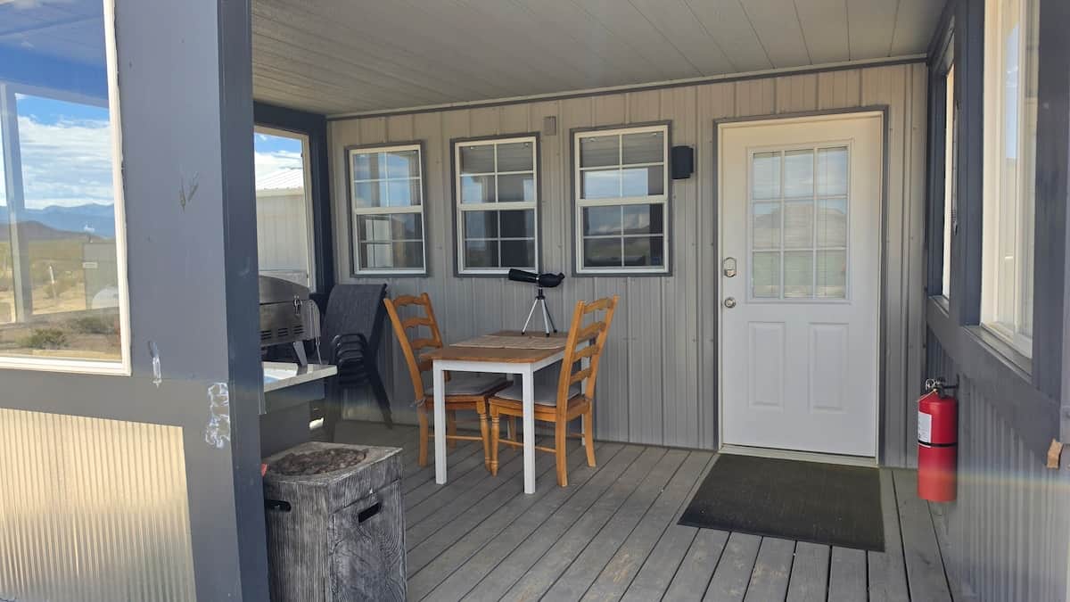Private covered patio-perfect for relaxing, dining, grilling, and stargazing.