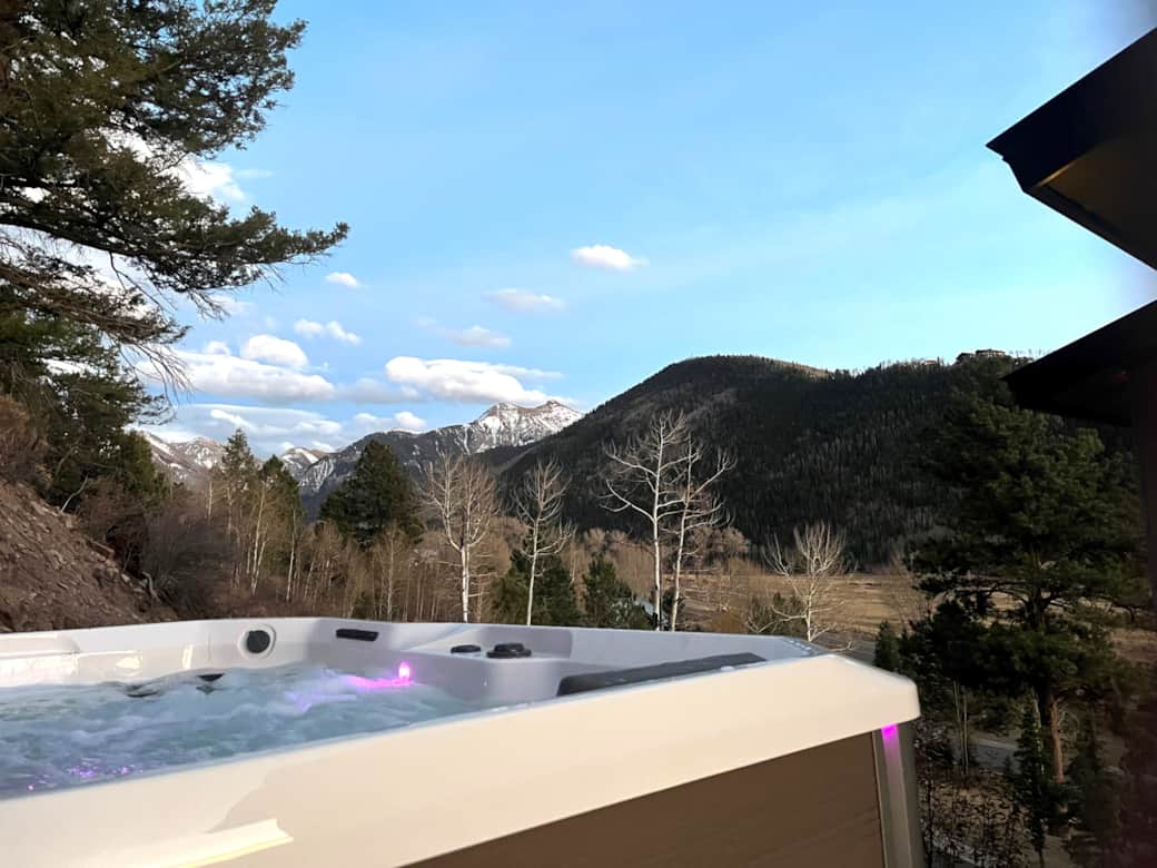 Private hot tub on back deck with unlimited mountain views