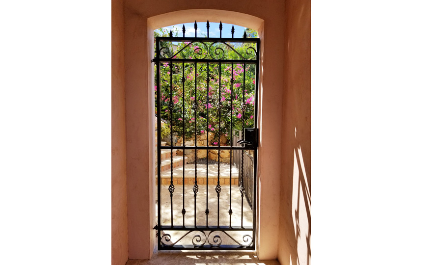 Private entry gate to Le Petit Bijou, view from the breezeway