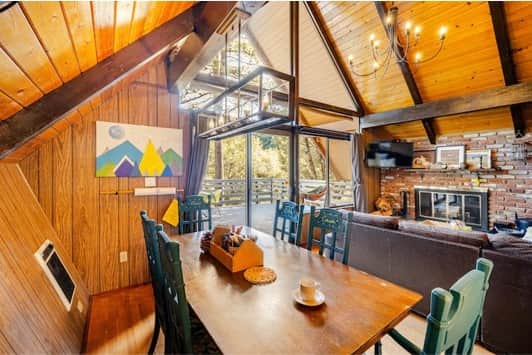 Dining room adjacent to the soaring, 2-story windows. Dining room adjacent to the soaring, 2-story windows.