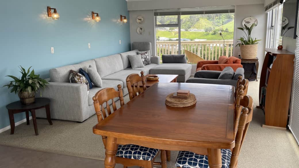 Family dining table seats 6, can extend for 8.