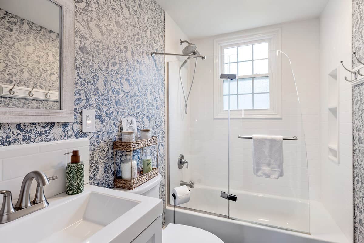 Whimsical wallpaper, bath salts, updated shower along with plush towels, body wash, shampoo, conditioner, and lotion. We provide a hair dryer with diffuser and make-up remover cloths too. 