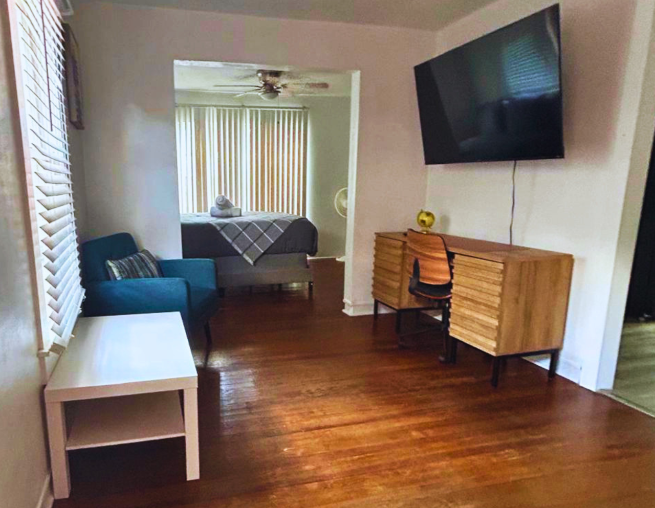 Comfortable living space with an accent chair and work desk. Lakeland, FL