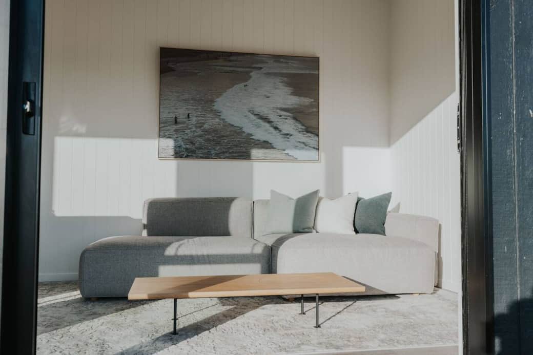 Step into our inviting living area, featuring a comfy couch perfect for lounging.