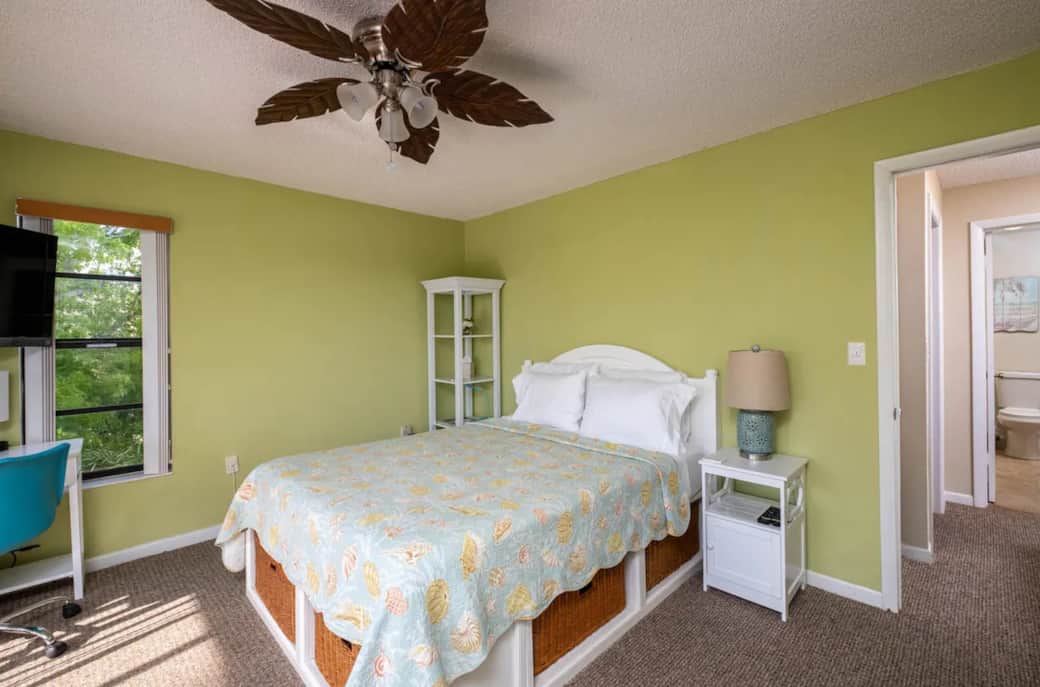 3rd Floor Primary Bedroom with Queen Memory Foam Mattress.  Desk with printer.