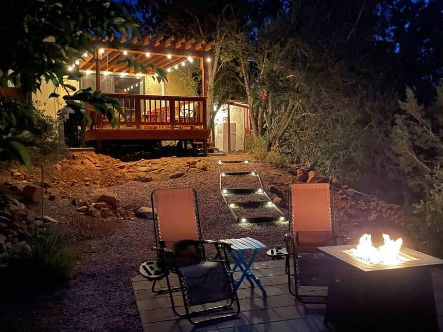 The back yard features a gas fire table, patio, deck with pergola and grill. The back yard features a gas fire table, patio, deck with pergola and grill.