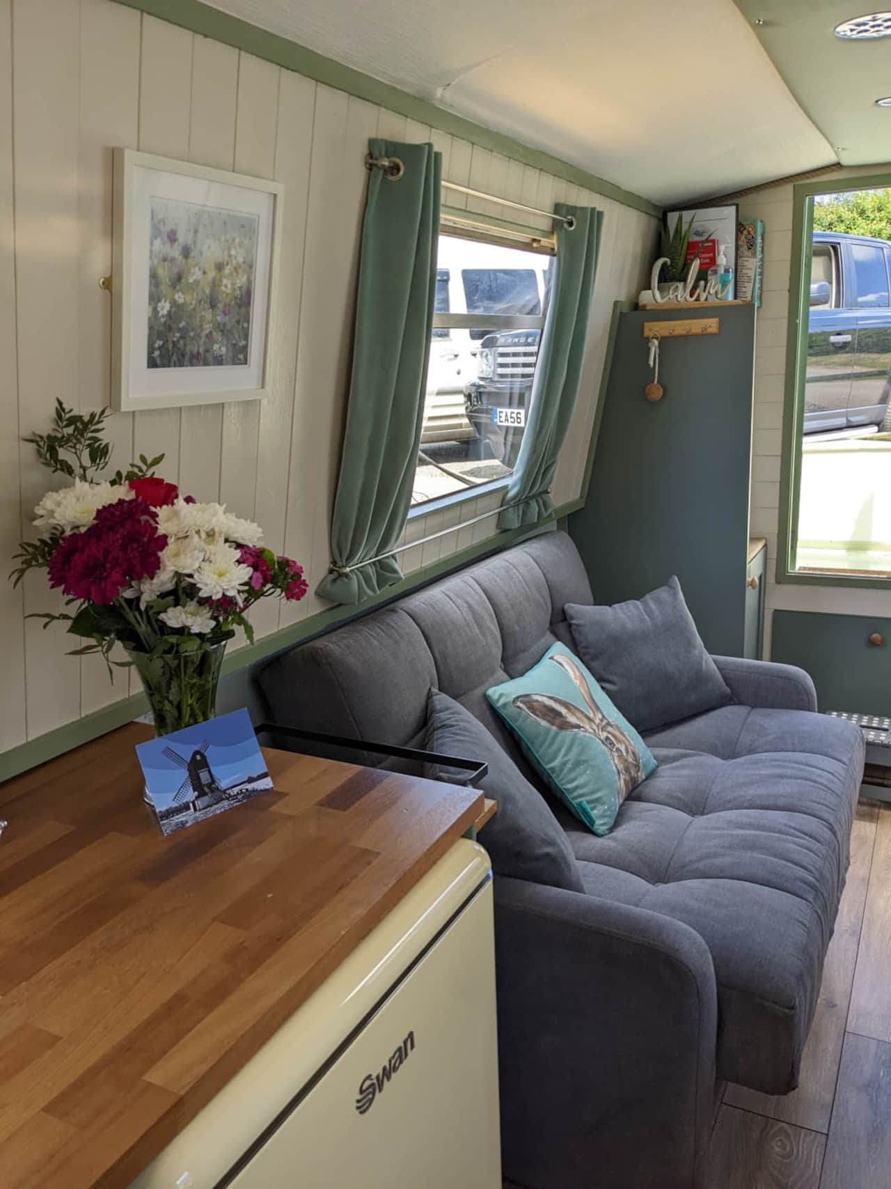 Sofabed in small canal boat for hire
