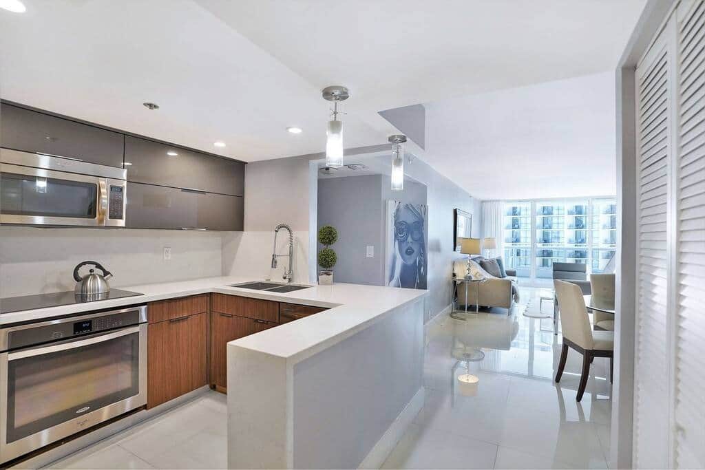 Fully equipped kitchen, washer/dryer across from kitchen 