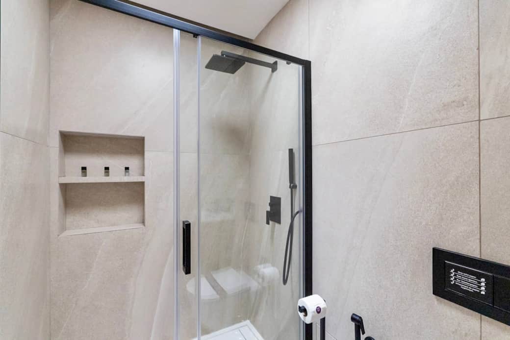 Bathroom with walk-in rainfall shower