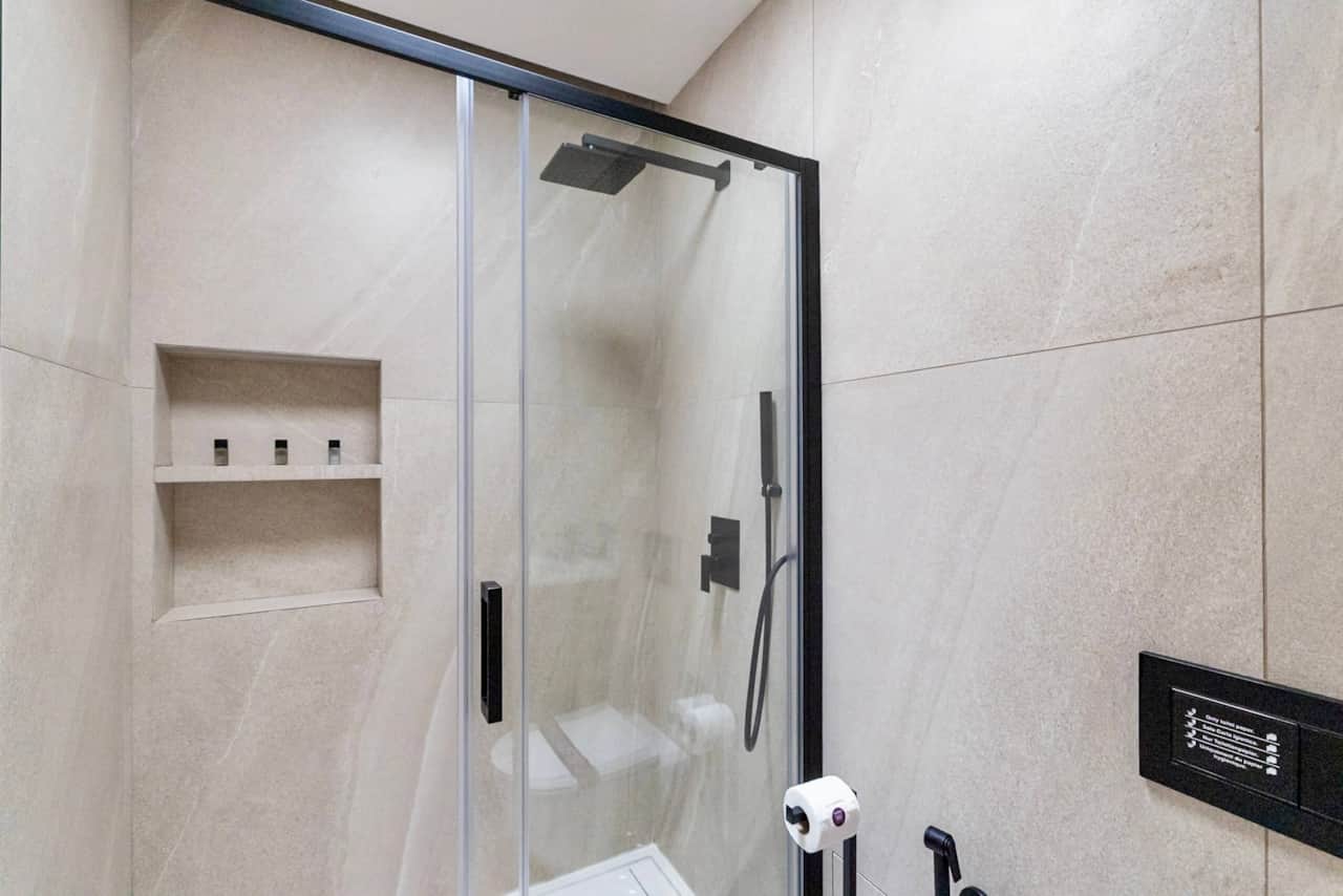Bathroom with walk-in rainfall shower