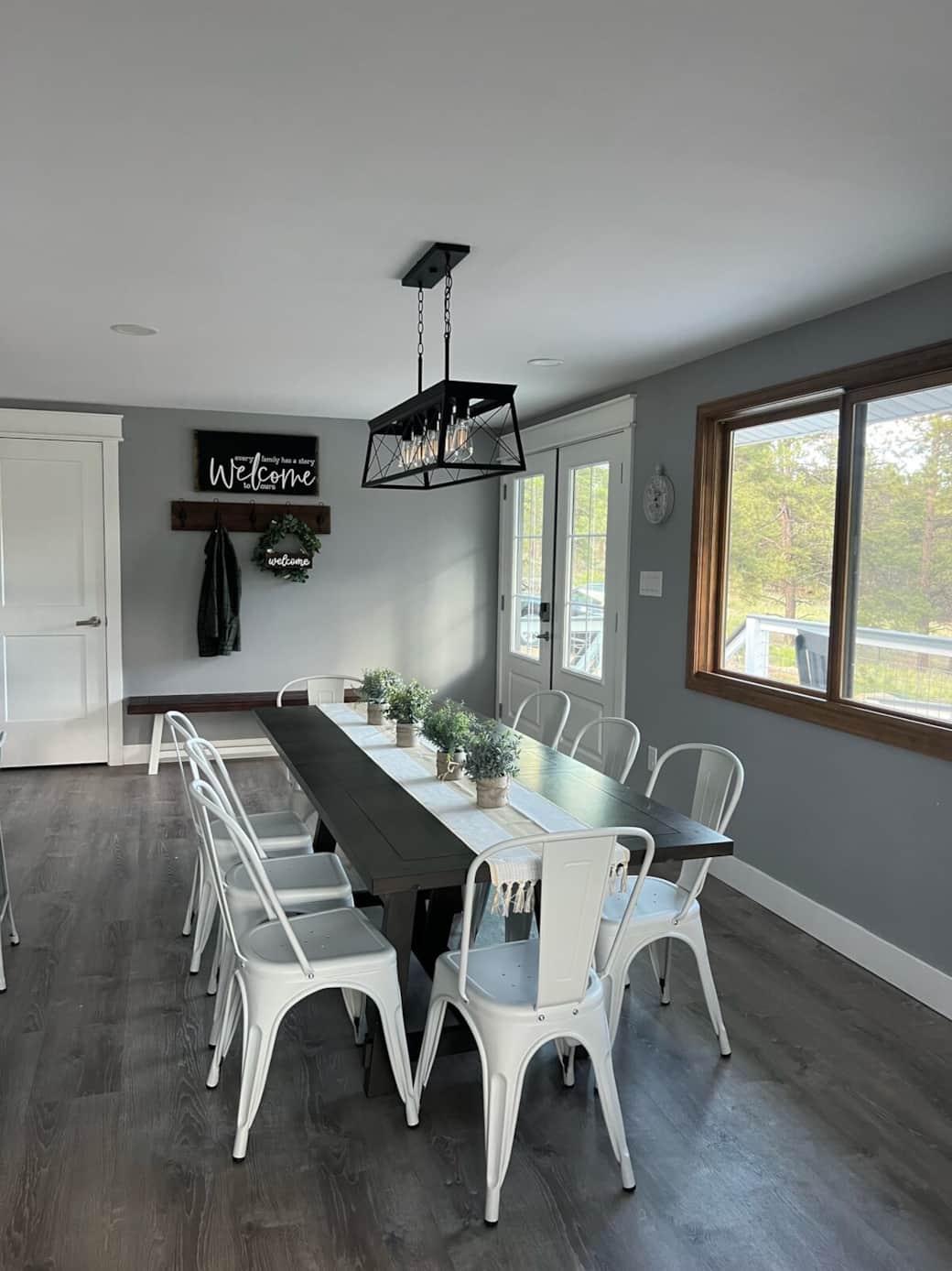 Dining room table and seating for eight in open concept front room