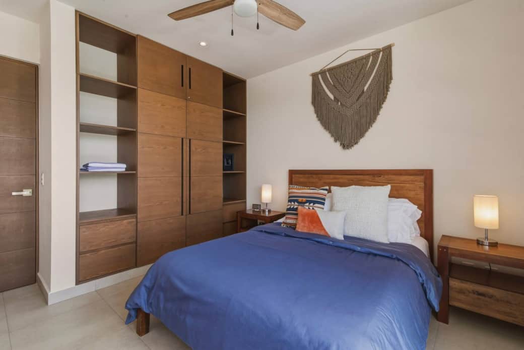 Not only does this bedroom feature a private balcony, A/C, ceiling fan, room-darkening shades, and a comfy queen bed, it also includes a full wardrobe, in-room safe, and beach towels for your convenience.
Not only does this bedroom feature a private balcony, A/C, ceiling fan, room-darkening shades, and a comfy queen bed, it also includes a full wardrobe, in-room safe, and beach towels for your convenience.