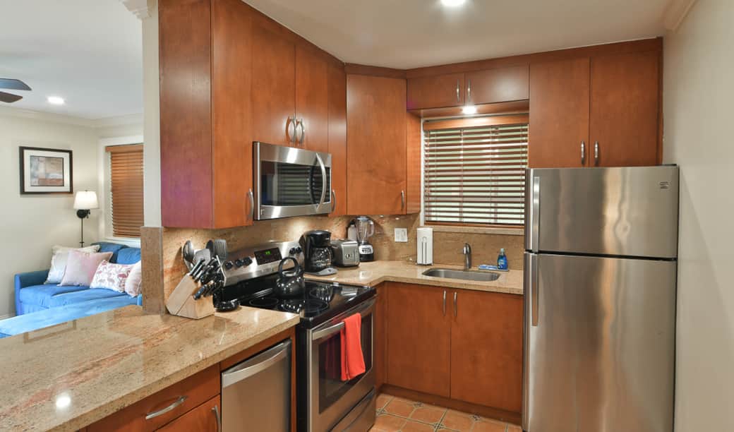 Kitchen with Coffee Maker, Toaster, Blender, Dishes, Pots, Pans, Storage Containers