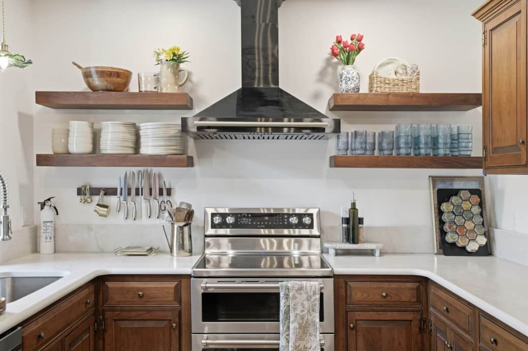 Fully stocked kitchen with double oven, dishwasher, oversized fridge, and wine/beverage fridge. Additional professional photos coming soon.