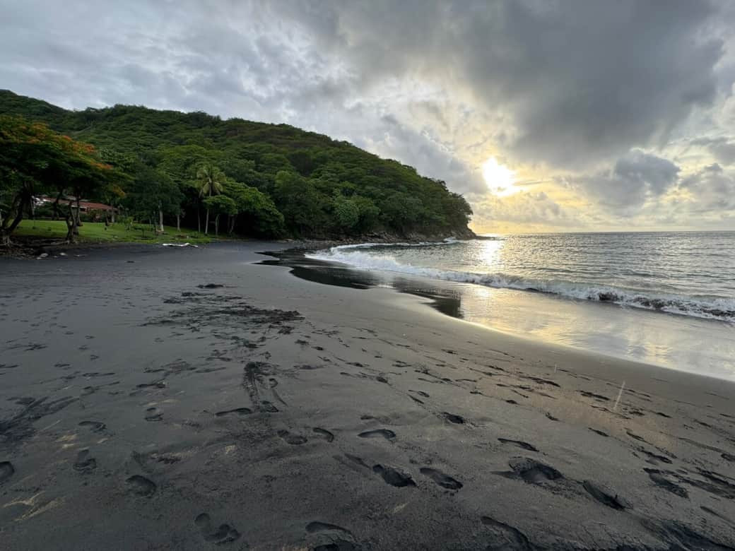 Below Villa Amor Azul.  Black sand Playa Pez Vela and a calm bay for swimming.