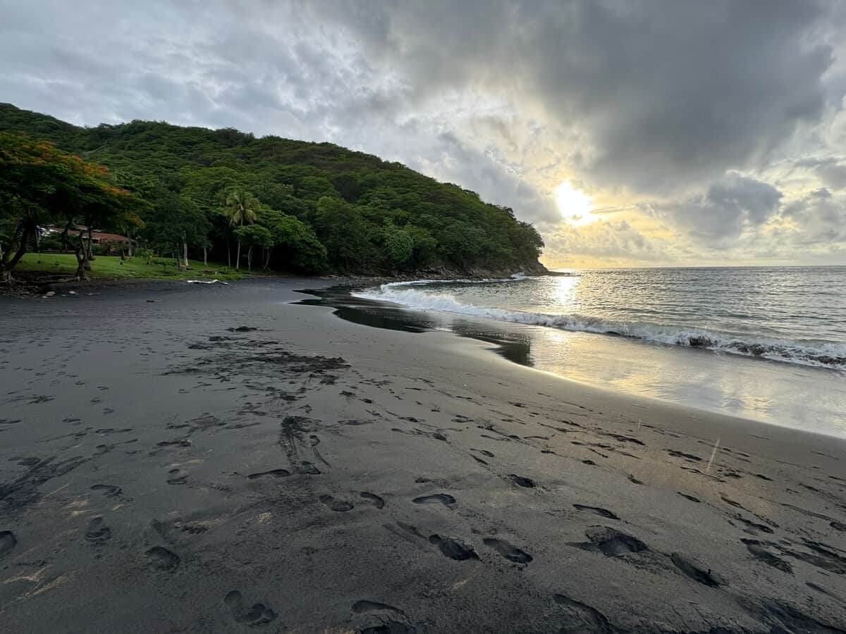 Below Villa Amor Azul.  Black sand Playa Pez Vela and a calm bay for swimming.