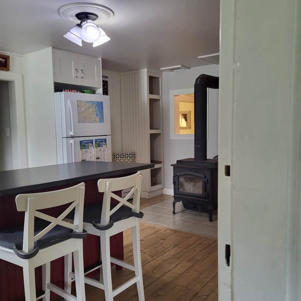 Wood stove is located in the heart of the home, the kitchen.