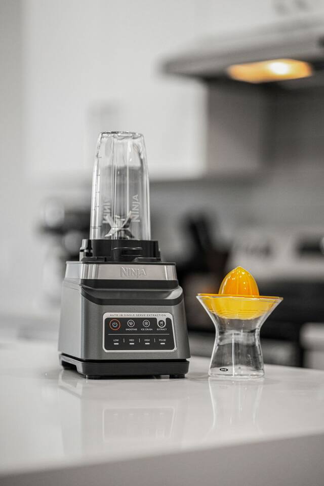 Fresh juice or smoothies made easy with the blender ready to go.