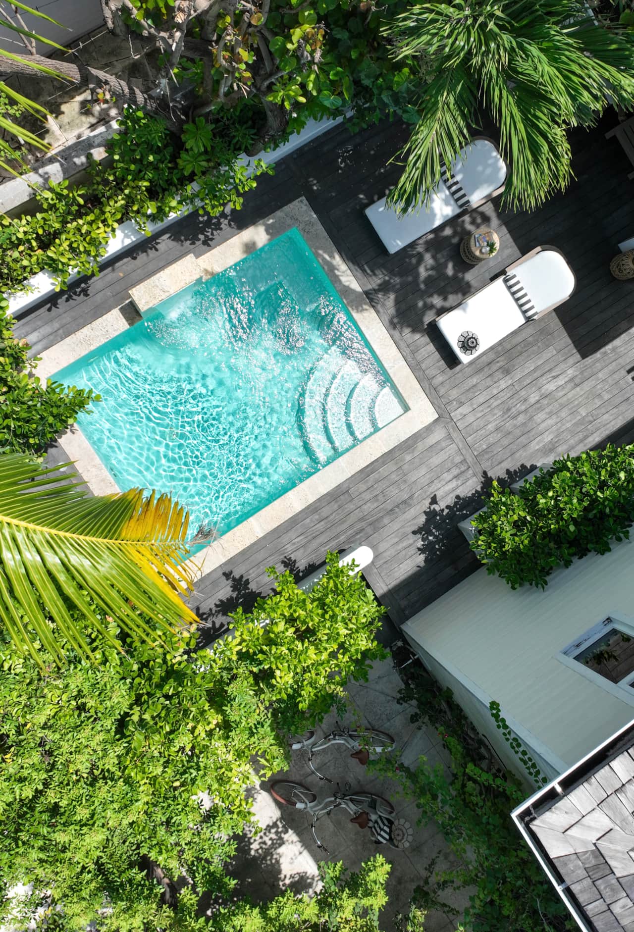 Bird's-eye view of the refreshing private plunge pool and sun deck at The Hideaway, Bahamas