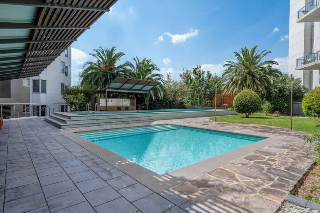 The clear blue waters and stone deck create an inviting atmosphere. Whether you're lounging by the poolside or taking a swim, this area offers a perfect escape from the hustle and bustle of daily life.The pool is located at floor 1.