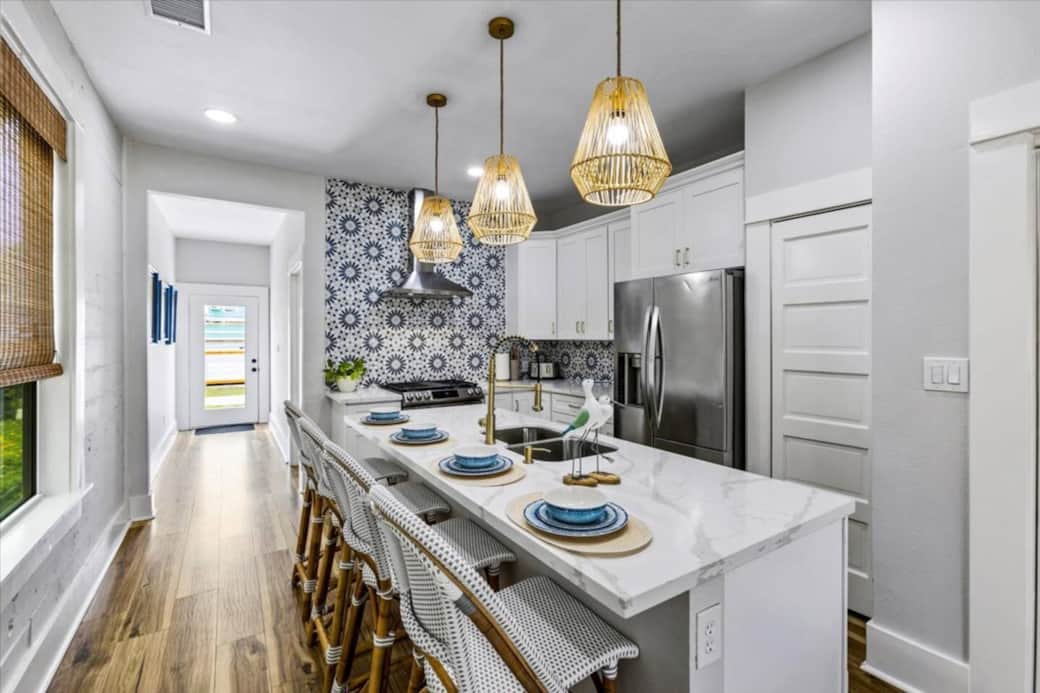 Full kitchen- Microwave (can also be used as an oven for 'double ovens') dishwasher, disposal, gas stove cook top and oven, full size refrigerator and freezer and blender. 