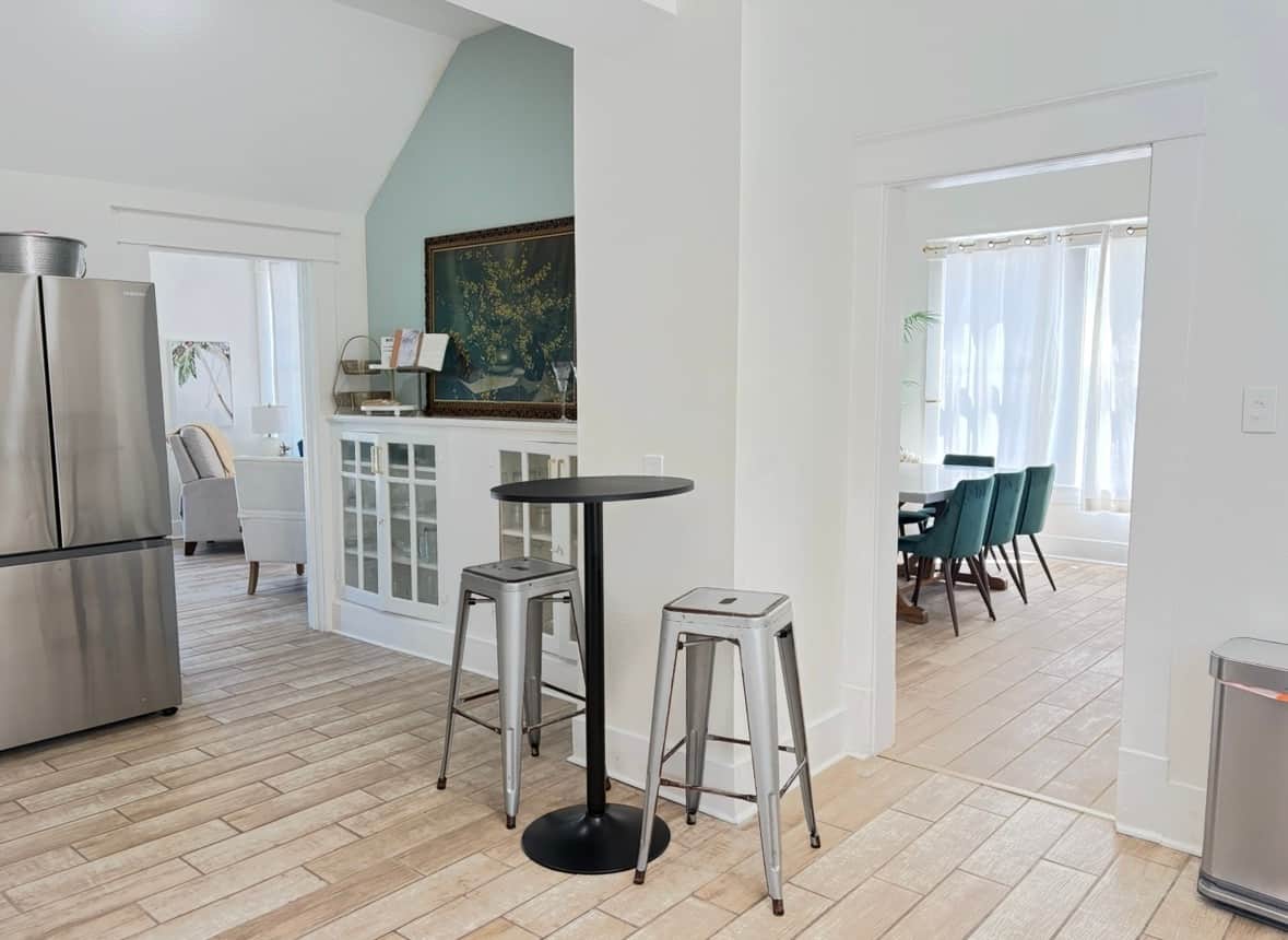 The kitchen easily flows into the dining room and front entry.  A full bathroom is tucked away near the kitchen.