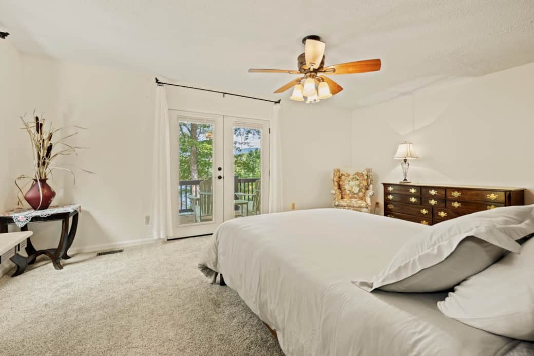 Main Level Master Bedroom with French Door Access to Private Deck Main Level Master Bedroom with French Door Access to Private Deck