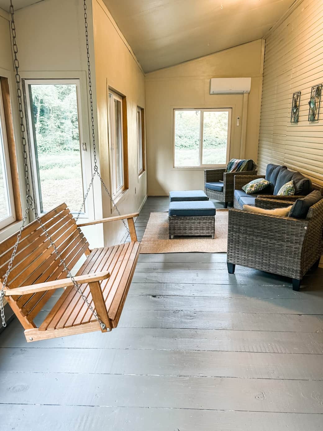 Cozy up on the enclosed porch with plush seating, a porch swing and tranquil views of the creek just outside. Cozy up on the enclosed porch with plush seating, a porch swing and tranquil views of the creek just outside.