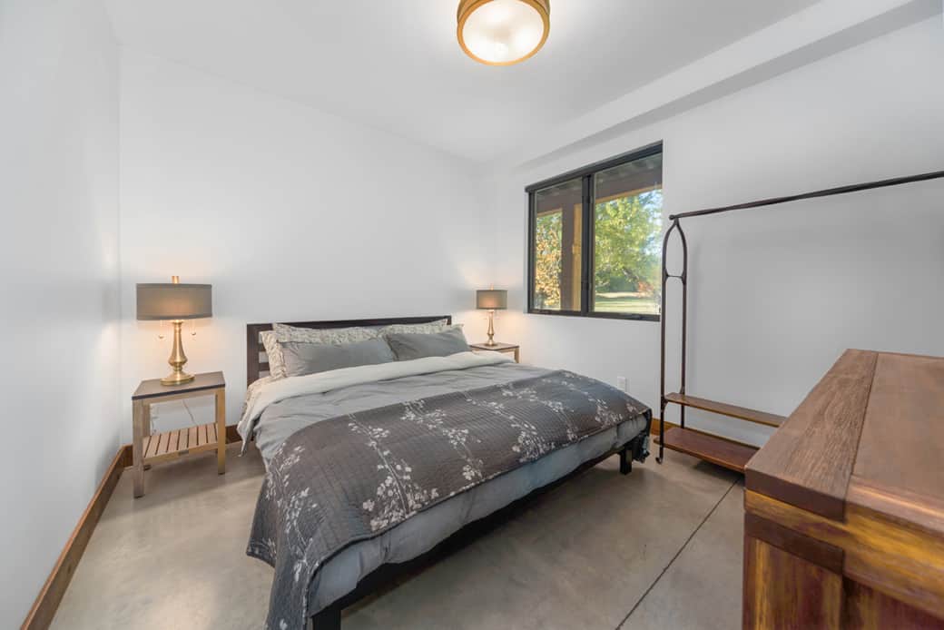 downstairs bedroom with king bed