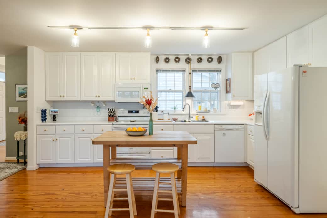 Bright functional workspace with island