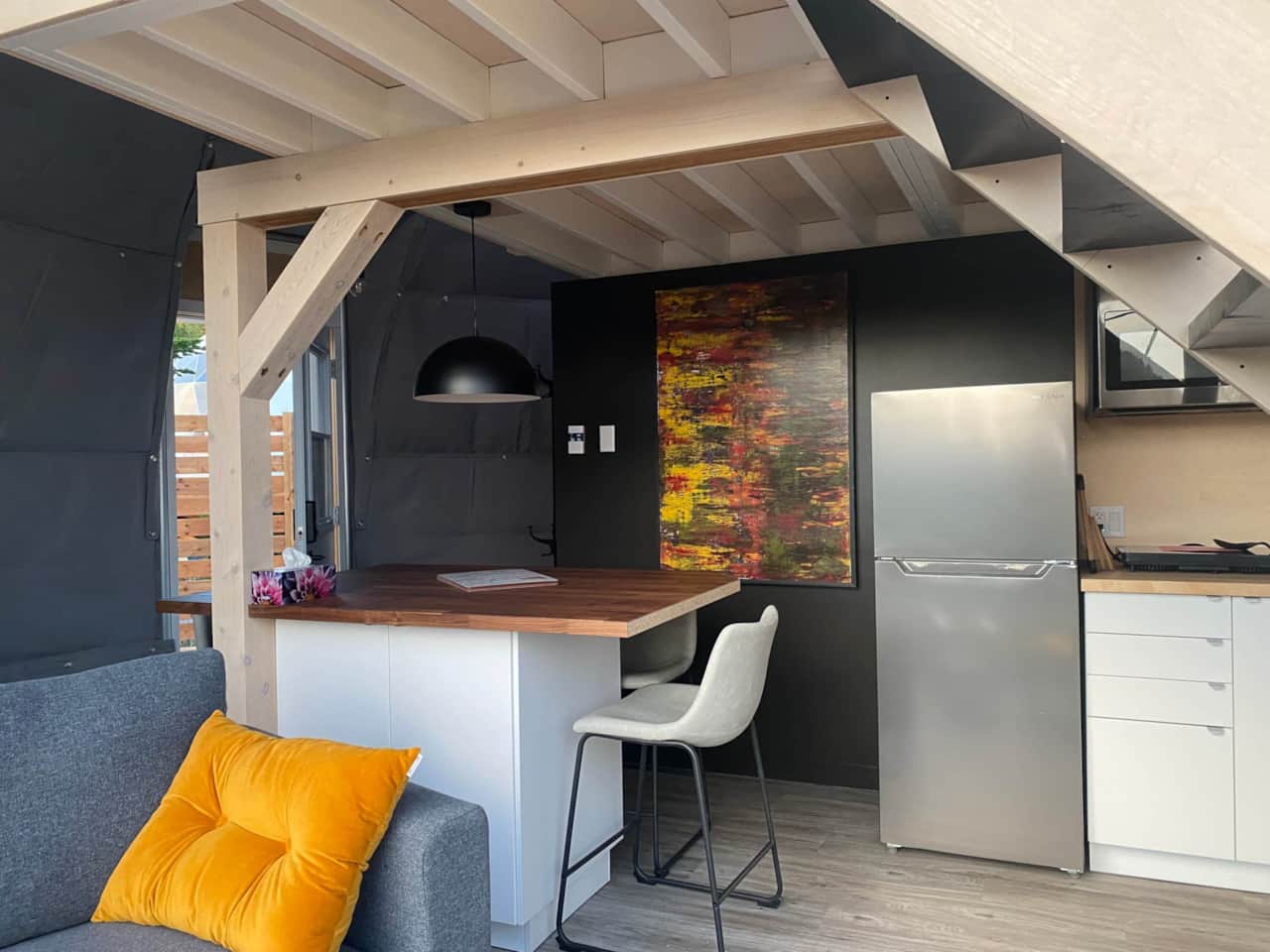 The kitchen island and small full kitchen offer all the amenities for your meals with a view!