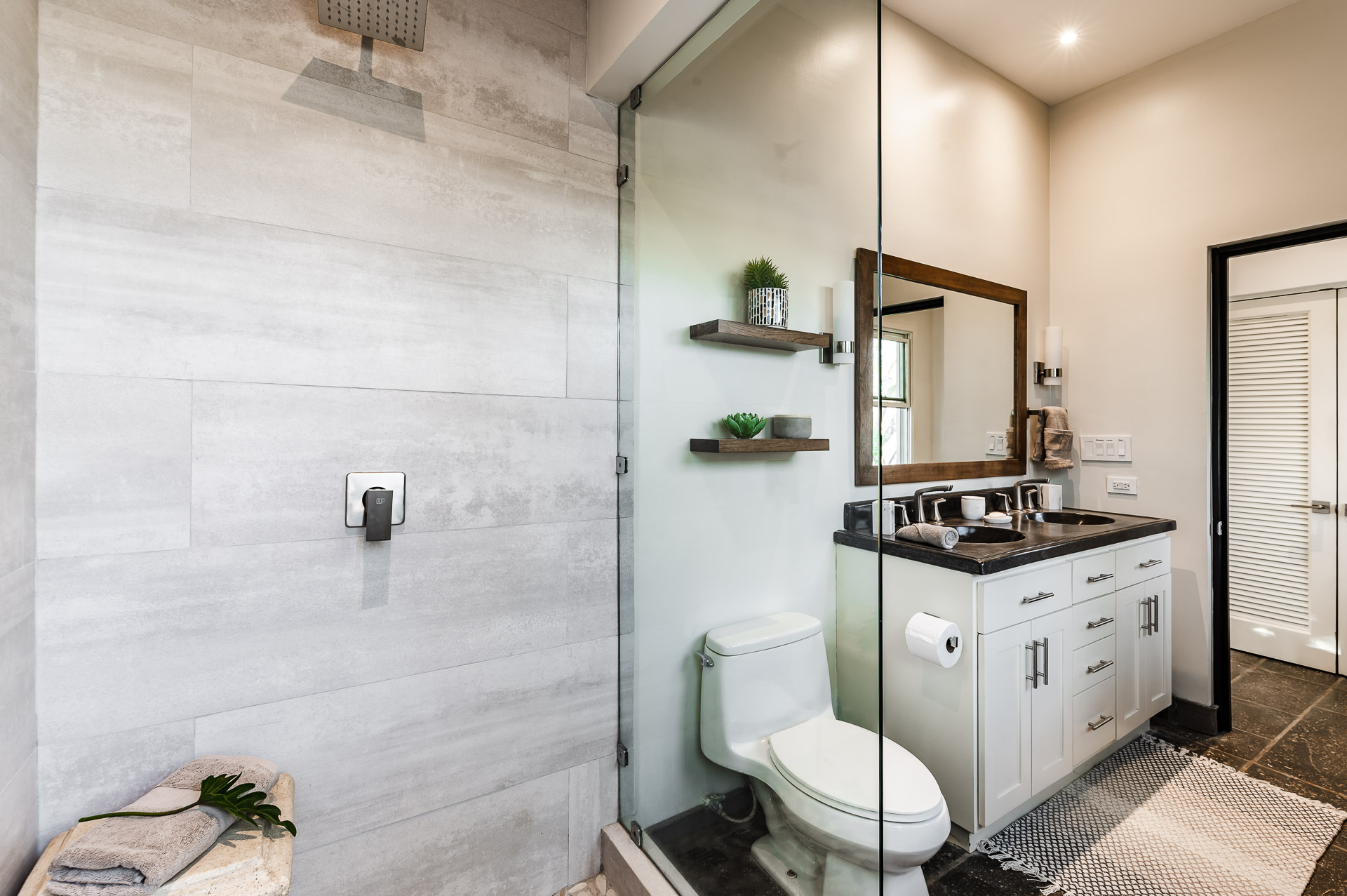 Indoor and outdoor shower and Mr. & Mrs. double sink vanity.