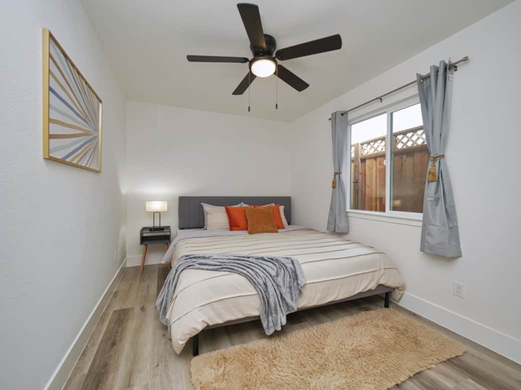 Experience a peaceful night's sleep on this inviting king-size bed!