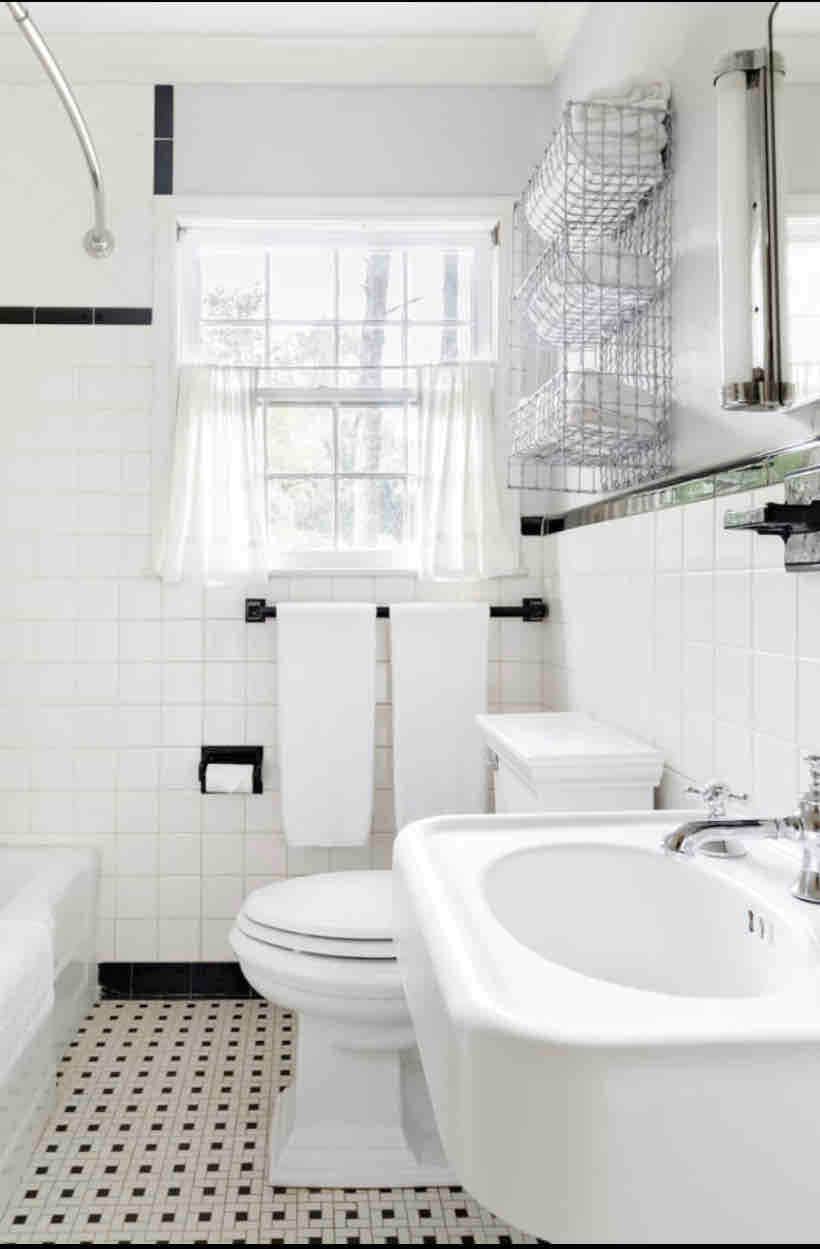 Restored vintage mid-century bathroom.  Loads of bright & light.