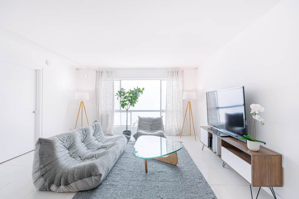 Experience the best of both worlds: a bright, roomy living space with a TV for endless entertainment