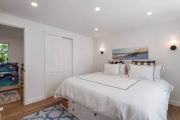 King suite downstairs with built-in storage bed