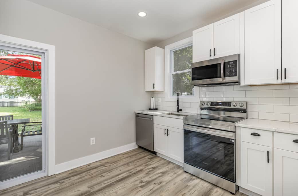 Sliding Glass Door off Kitchen to Large Side Patio Sliding Glass Door off Kitchen to Large Side Patio