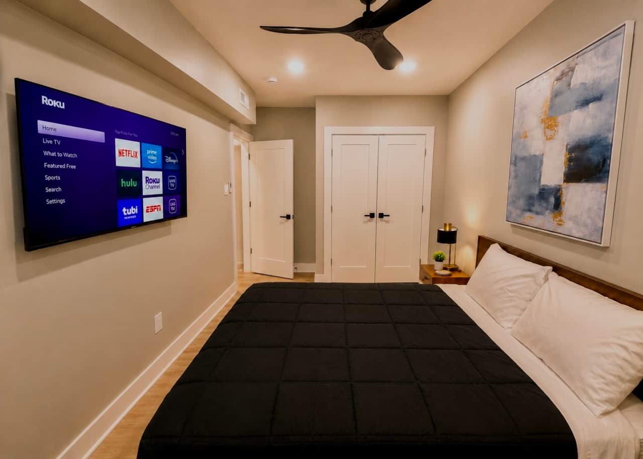  bedroom one with queen, bed, and large closet