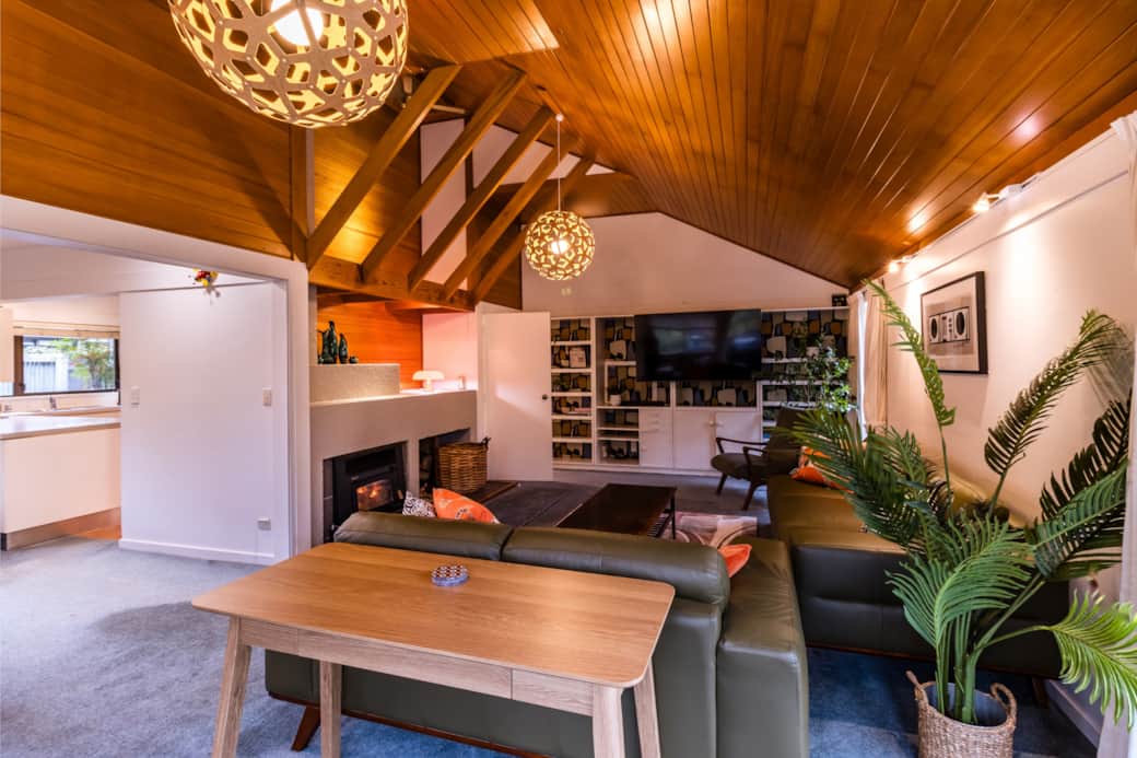 Living area with a dedicated desk setup—just borrow the master chair and you’re good to go.