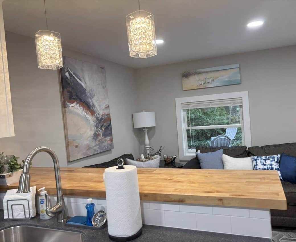 The kitchen flows into the living room area. It is fully stocked with everything that you need to prepare a meal. The kitchen flows into the living room area. It is fully stocked with everything that you need to prepare a meal.