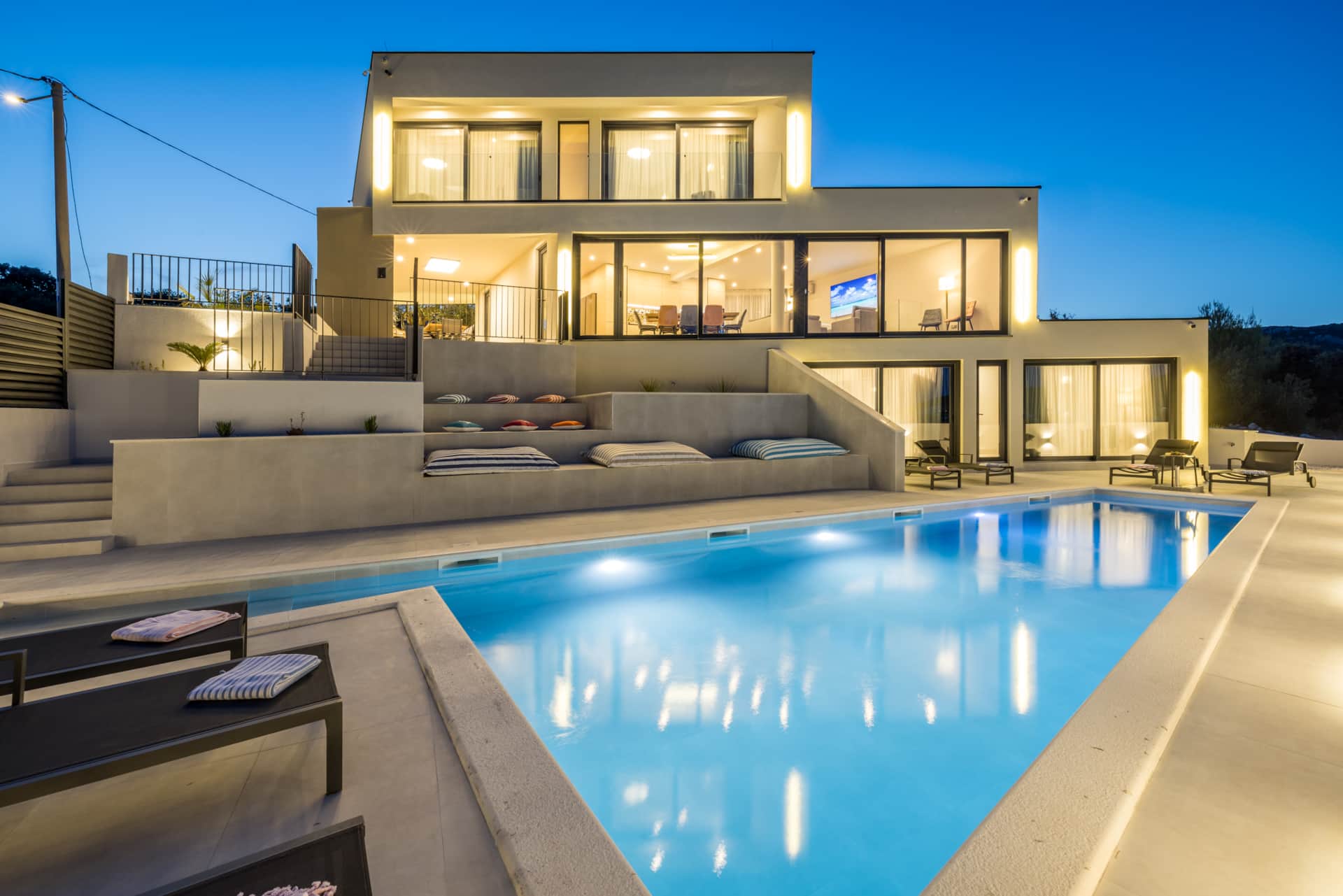 Mar Escape Villa pool and terrace at dusk