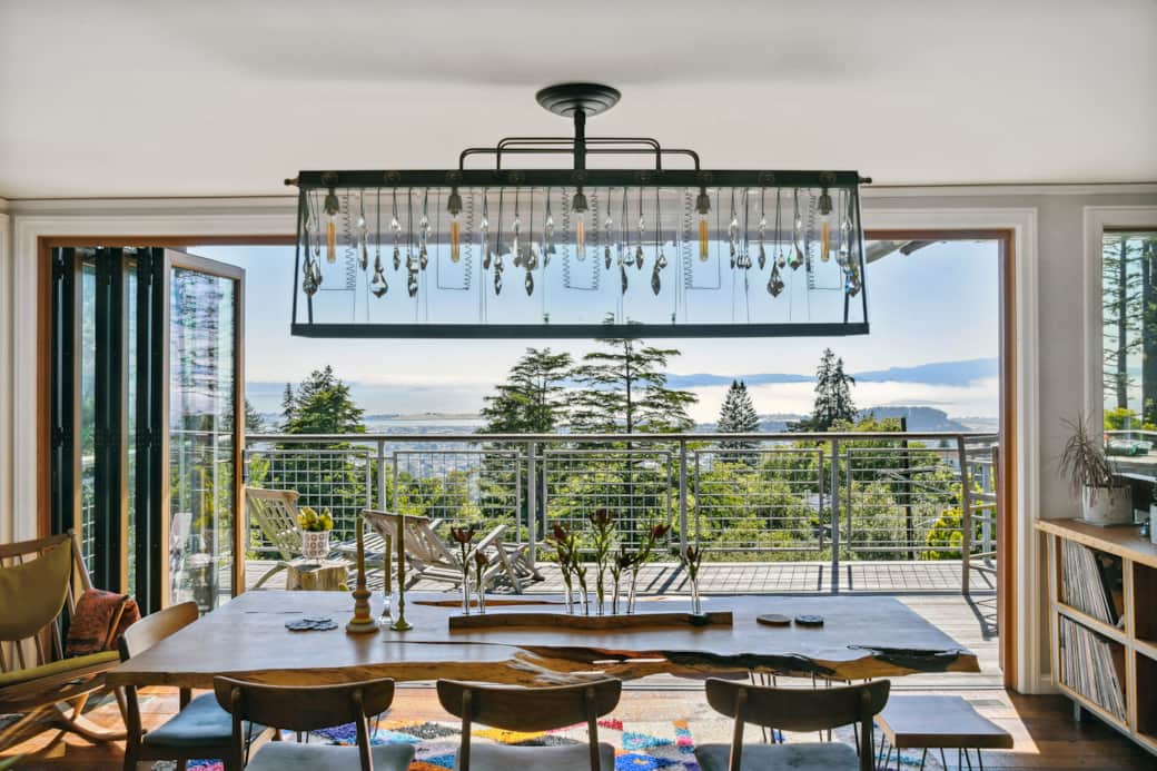 Live edge dining table with a view of the Bay 
