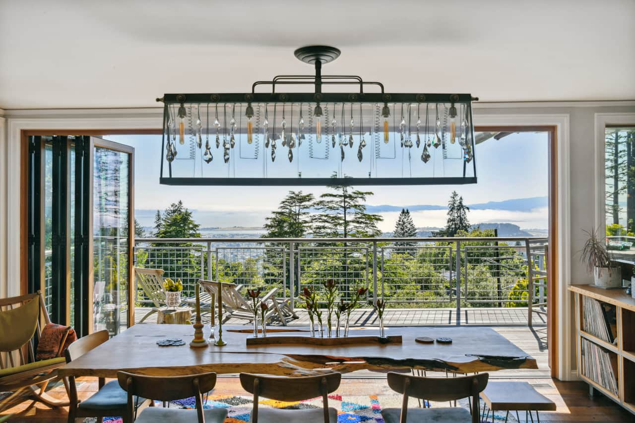 Live edge dining table with a view of the Bay 