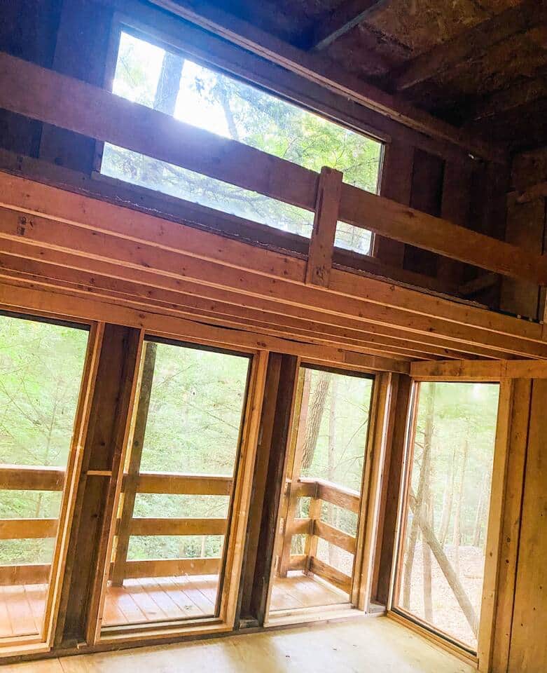 The indoor window view from the tree house.  The outdoor balcony allows for relaxing views of the waterfall and creek on the property. 